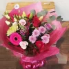 Raspberry Dream Florist Choice Hand Tied Bouquet in water