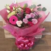 Raspberry Hand tied bouquet of beautiful flowers in shades of red and pink