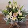 With Love hand tied bouquet in water
