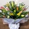 Mixed Lily Extravaganza hand tied bouquet - Deliver these flowers near me
